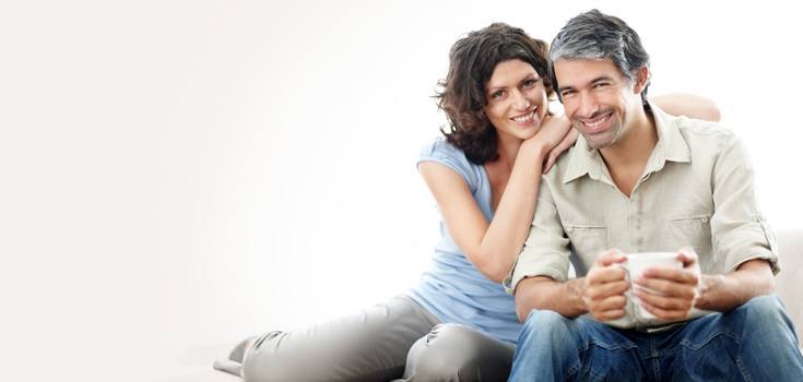 Couple holding cup
